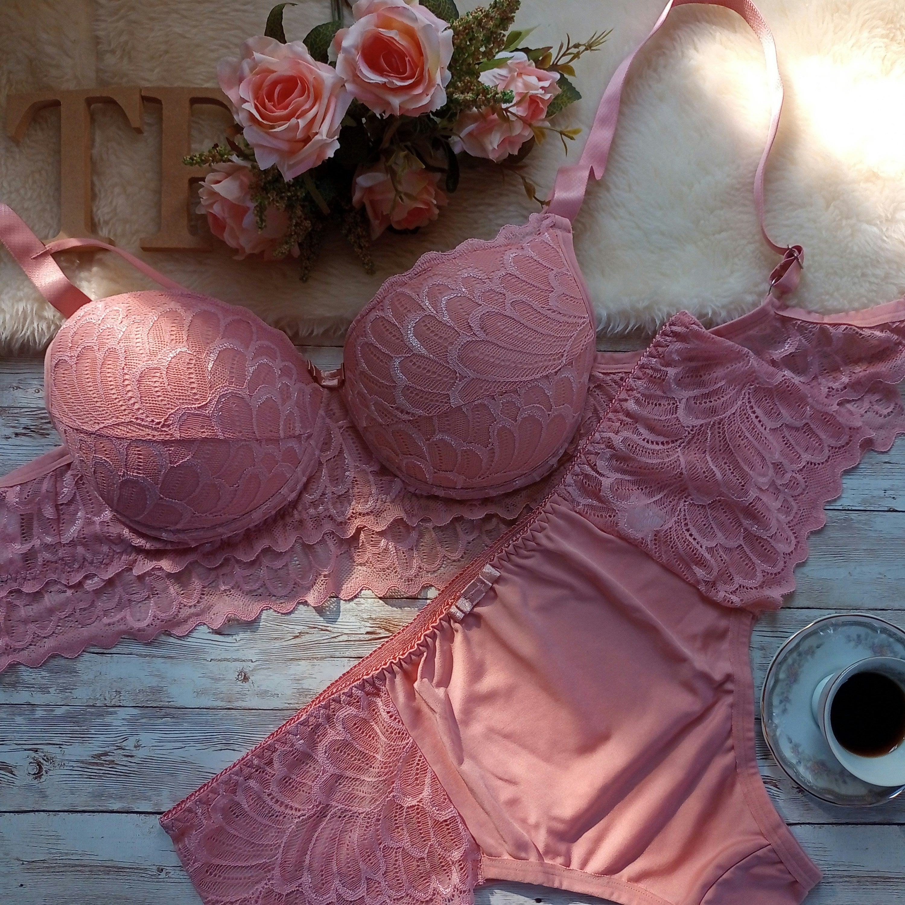 Pink lace bras and panties.